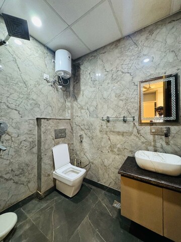 Bathroom in  Office Space at Aarcity Krishna Apra D Mall, Shakti Khand 2 – for Rent