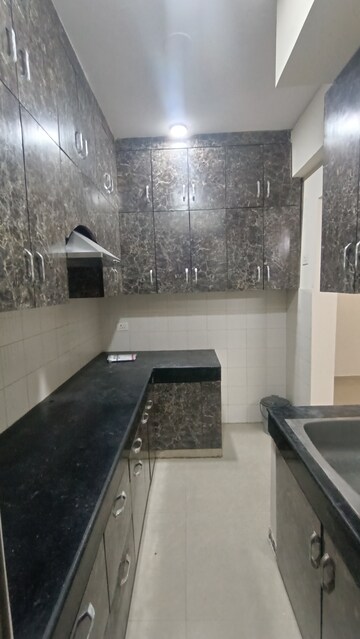 Kitchen in 2 BHK Apartment at Aditya Urban Casa, Sector 78 – for Rent
