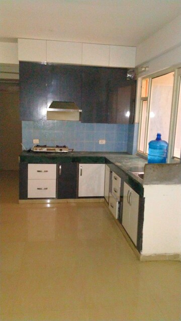 Kitchen in 2 BHK Apartment at ROF Aalayas, Sector 102 – for Rent