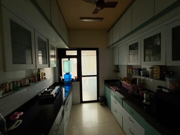 Kitchen in 2 BHK Apartment at Maharaja Retreat CHS, Goregaon East – for Rent