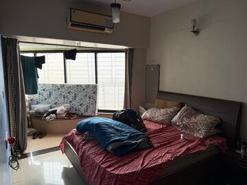 Bedroom in 2 BHK Apartment at Maharaja Retreat CHS, Goregaon East – for Rent