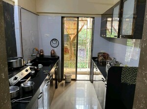 Kitchen in 2 BHK Apartment at Madhav Palacia, Ghodbunder Road – for Sale