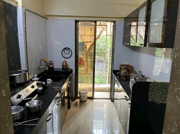 Kitchen in 2 BHK Apartment at Madhav Palacia, Ghodbunder Road – for Sale