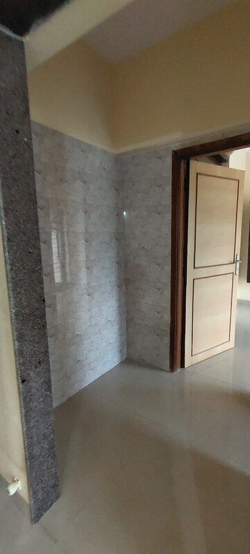 Building Lobby in 1 BHK Apartment at K Raheja Heights, Malad East – for Rent