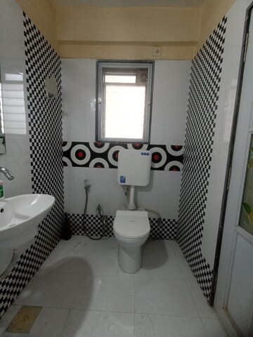 Bathroom in 2 BHK Apartment at Nakshatra Swastik Alps, Brahmand – for Rent