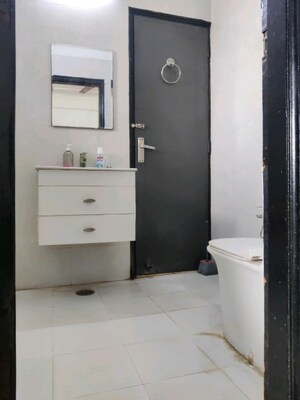 Bathroom in 3.5 BHK Apartment at Gaur Green City, Indrapuram – for Sale