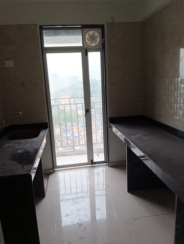 Kitchen in 2 BHK Apartment at Ajmera Crosstown One, Kalyan West – for Rent
