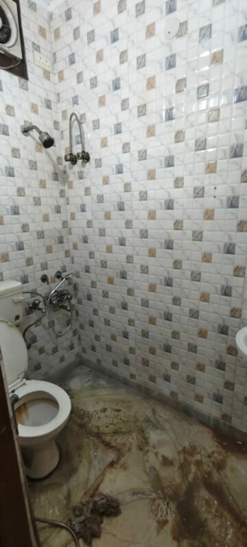 Bathroom in 4 BHK Builder Floor at Soho Awas Apartments, Gyan Khand I – for Rent