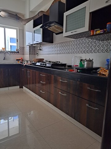 Kitchen in 3 BHK Apartment at Paramount Grande, Sarusajai – for Rent