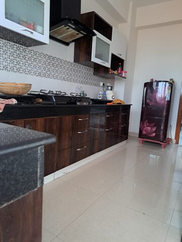 Kitchen in 3 BHK Apartment at Paramount Grande, Sarusajai – for Rent