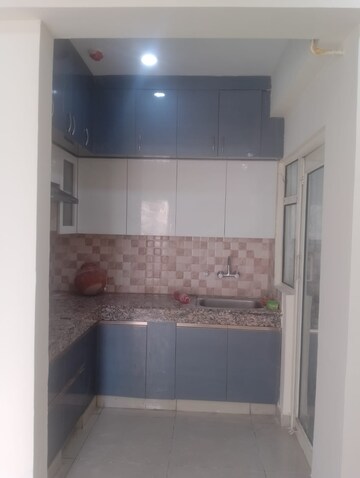 Kitchen in 2 BHK Apartment at Panchsheel Greens, Sector 16 Greater Noida – for Rent