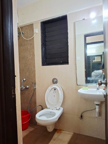 Bathroom in 2 BHK Apartment at Eco Elegance, Andheri East – for Rent