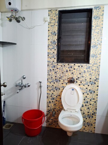Bathroom in 2 BHK Apartment at Eco Elegance, Andheri East – for Rent