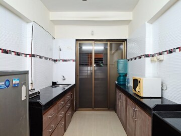 Kitchen in 2 BHK Apartment at Eco Elegance, Andheri East – for Rent