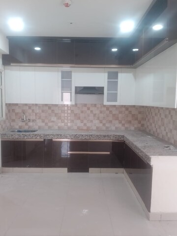 Kitchen in 3 BHK Apartment at Panchsheel Greens, Sector 16 Greater Noida – for Rent