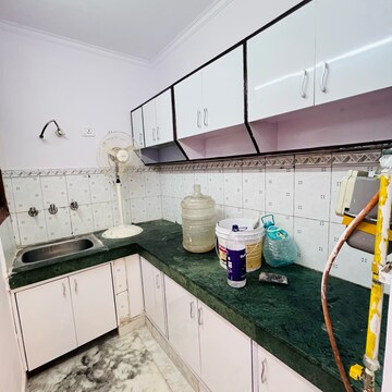 Kitchen in 2 BHK Builder Floor at Khirki Extension – for Sale