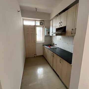 Kitchen in 2 BHK Apartment at Supertech Cape Town, Sector 74 – for Rent