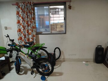 Living Room in 1 BHK Apartment at Lokpuram CHS, Vasant Vihar – for Rent