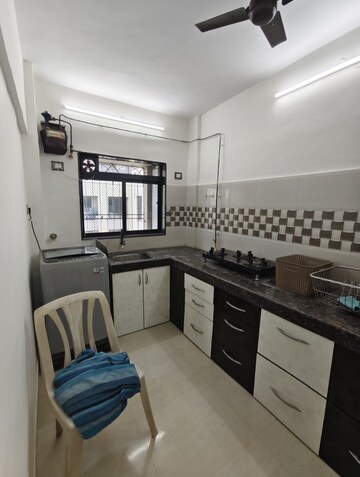 Kitchen in 1 BHK Apartment at Dheeraj Uphar CHS. LTD., Malad East – for Rent