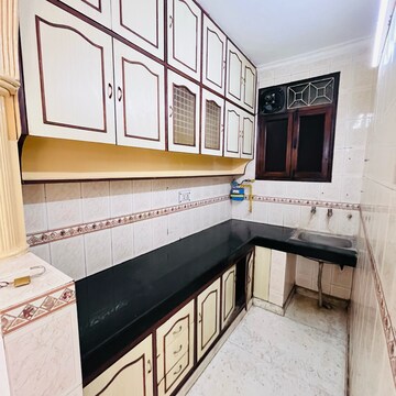 Kitchen in 1 BHK Builder Floor at Khirki Extension – for Sale