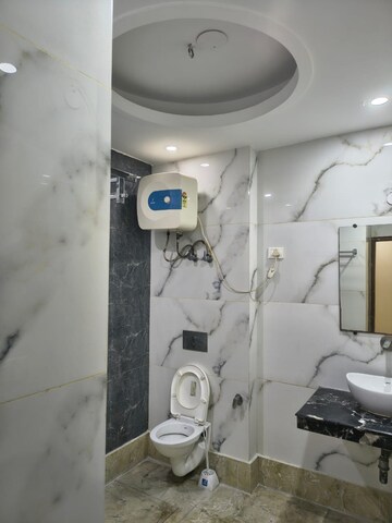 Bathroom in 3 BHK Apartment at RWA Apartments Sector 29, Sector 29 – for Sale