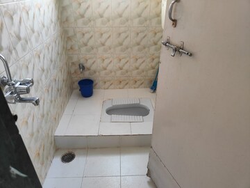 Bathroom in 2 BHK Apartment at Sumangal Heights, Anand Nagar – for Rent