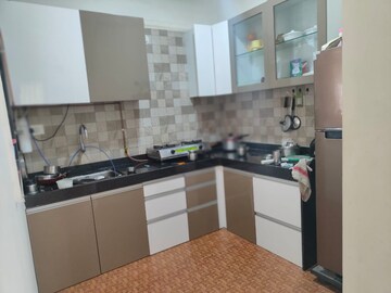 Kitchen in 2 BHK Apartment at Mittal Sun Aura, Sinhagad Road – for Rent