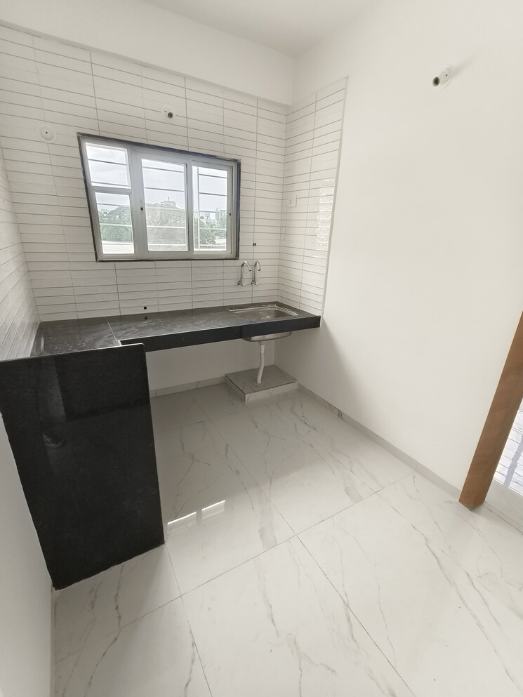 Kitchen, wadgaon sheri 1 Bedroom 600 Sq.Ft. Apartment In Wadgaon Sheri Pune 9111686