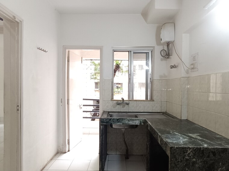 Kitchen, ramesh-hermes-heritage-phase-2 1 Bedroom 650 Sq.Ft. Apartment In Shastrinagar Pune 9111791