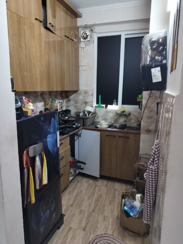 Kitchen in 2.5 BHK Apartment at Amrapali Golf Homes, Sector 4 Greater Noida – for Rent
