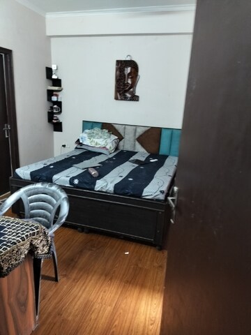 Master Bedroom in 2.5 BHK Apartment at Amrapali Golf Homes, Sector 4 Greater Noida – for Rent