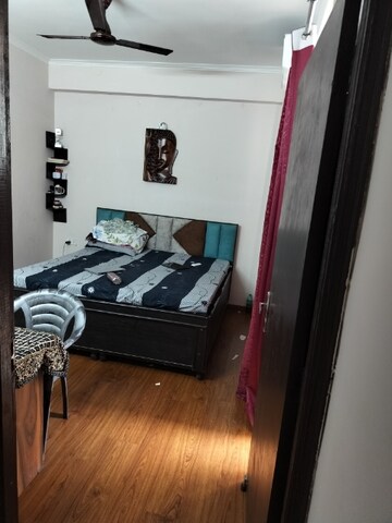 Master Bedroom in 2.5 BHK Apartment at Amrapali Golf Homes, Sector 4 Greater Noida – for Rent