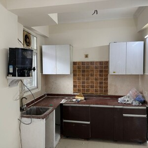 Kitchen in 2.5 BHK Apartment at Amrapali Zodiac, Sector 120 – for Sale