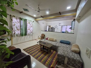 Living Room in 2 BHK Apartment at Karan Ashiyana, Wadgaon Sheri – for Sale