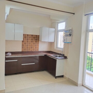 Kitchen in 2.5 BHK Apartment at Amrapali Zodiac, Sector 120 – for Rent