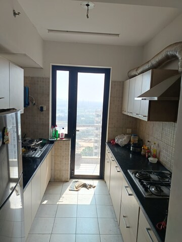 Kitchen in 3 BHK Apartment at Conscient Heritage Max, Sector 102 – for Rent
