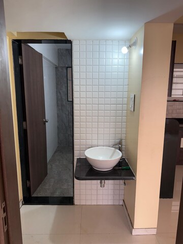 Bathroom in 2 BHK Apartment at Venkateshwara Fragrancia, Koregaon – for Rent