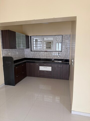 Kitchen in 2 BHK Apartment at Venkateshwara Fragrancia, Koregaon – for Rent