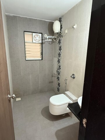 Bathroom in 2 BHK Apartment at Venkateshwara Fragrancia, Koregaon – for Rent