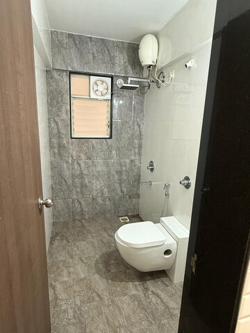 Bathroom in 2 BHK Apartment at Venkateshwara Fragrancia, Koregaon – for Rent