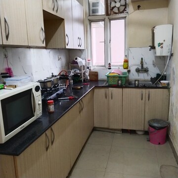 Kitchen in 2 BHK Apartment at Supertech Cape Town, Sector 74 – for Rent
