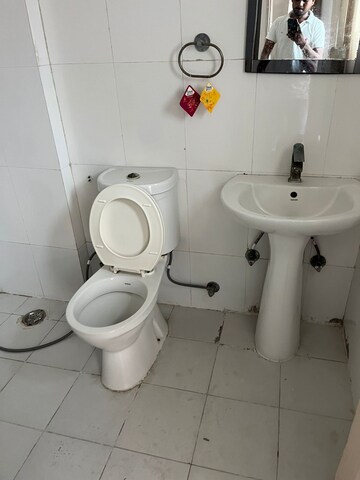 Bathroom in 2 BHK Apartment at Amrapali Zodiac, Sector 120 – for Rent