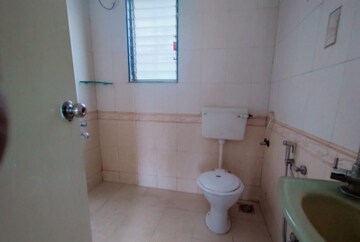 Bathroom in 2 BHK Apartment at Sun Empire, Sinhagad – for Rent