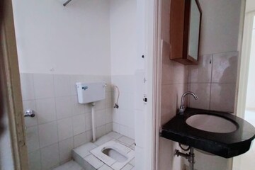 Bathroom in 2 BHK Apartment at Sun Empire, Sinhagad – for Rent