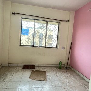 Bedroom in 1 BHK Apartment at Swastik Park CHS, Brahmand – for Sale