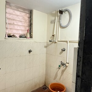 Bathroom in 1 BHK Apartment at Swastik Park CHS, Brahmand – for Sale