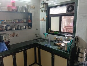 Kitchen in 1 BHK Apartment at Om Sagar Shantinagar CHS, Mira Road – for Sale