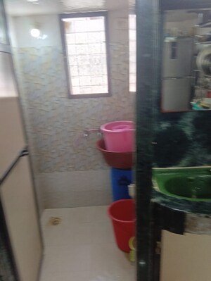Bathroom in 1 BHK Apartment at Om Sagar Shantinagar CHS, Mira Road – for Sale