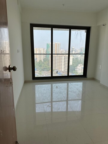 Master Bedroom in 2 BHK Apartment at Naman Habitat, Andheri West – for Sale