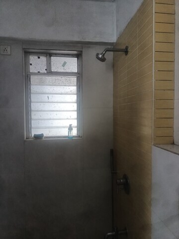 Bathroom in 2 BHK Apartment at Group Seven Rushi Heights, Goregaon East – for Rent